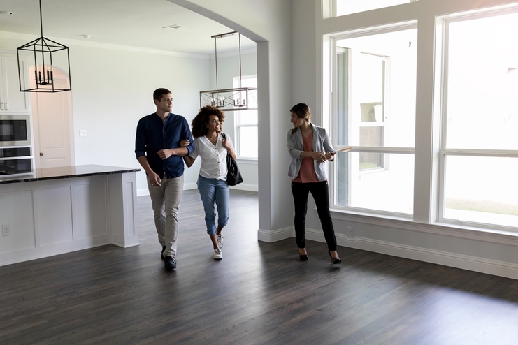 couple inspecting a home for sale in State College, PA with their State College PA Realtor