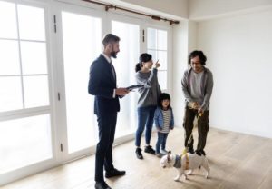 Family inspecting a home for sale in State College, PA with their State College PA Realtor