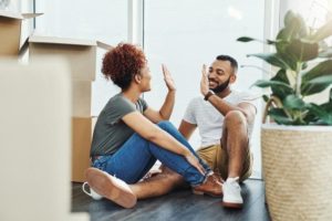 Couple sitting on the floor